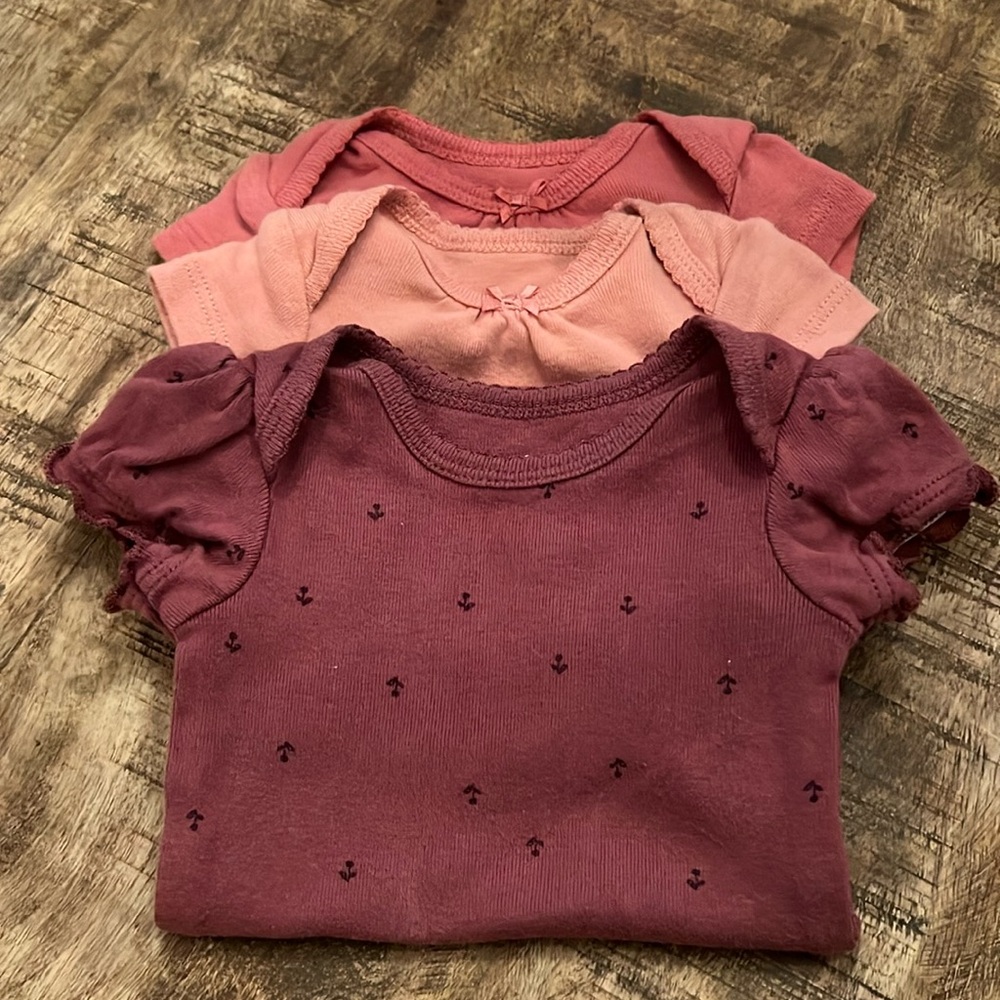 Carter’s Newborn onesies, bundle of 4.